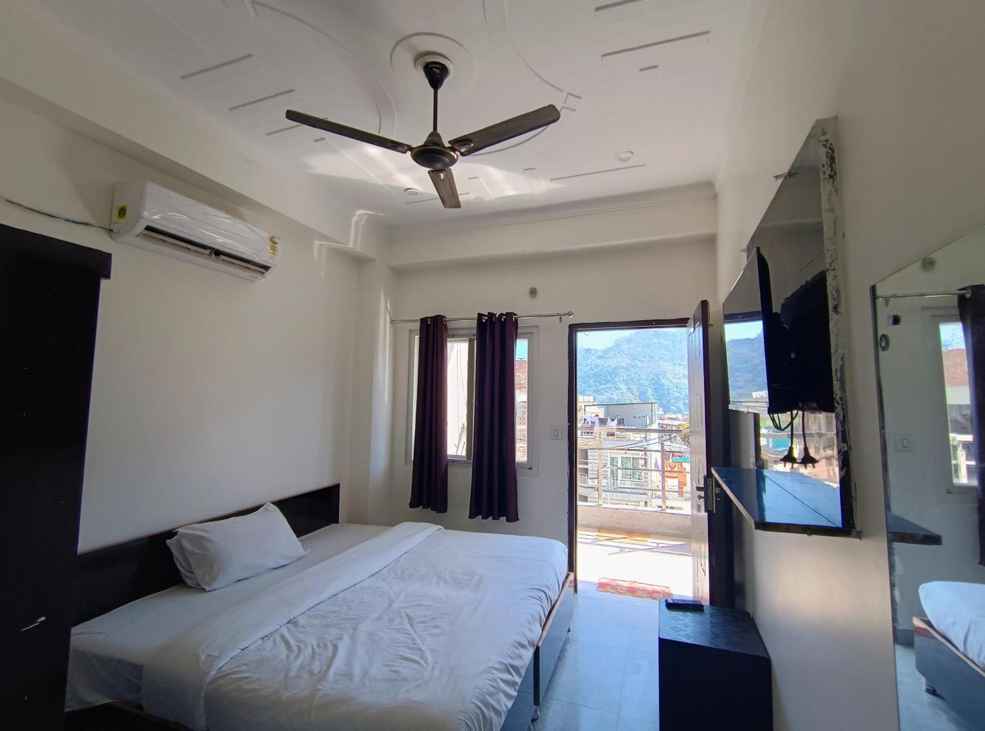 Hotel Aman Rishīkesh Rum bild